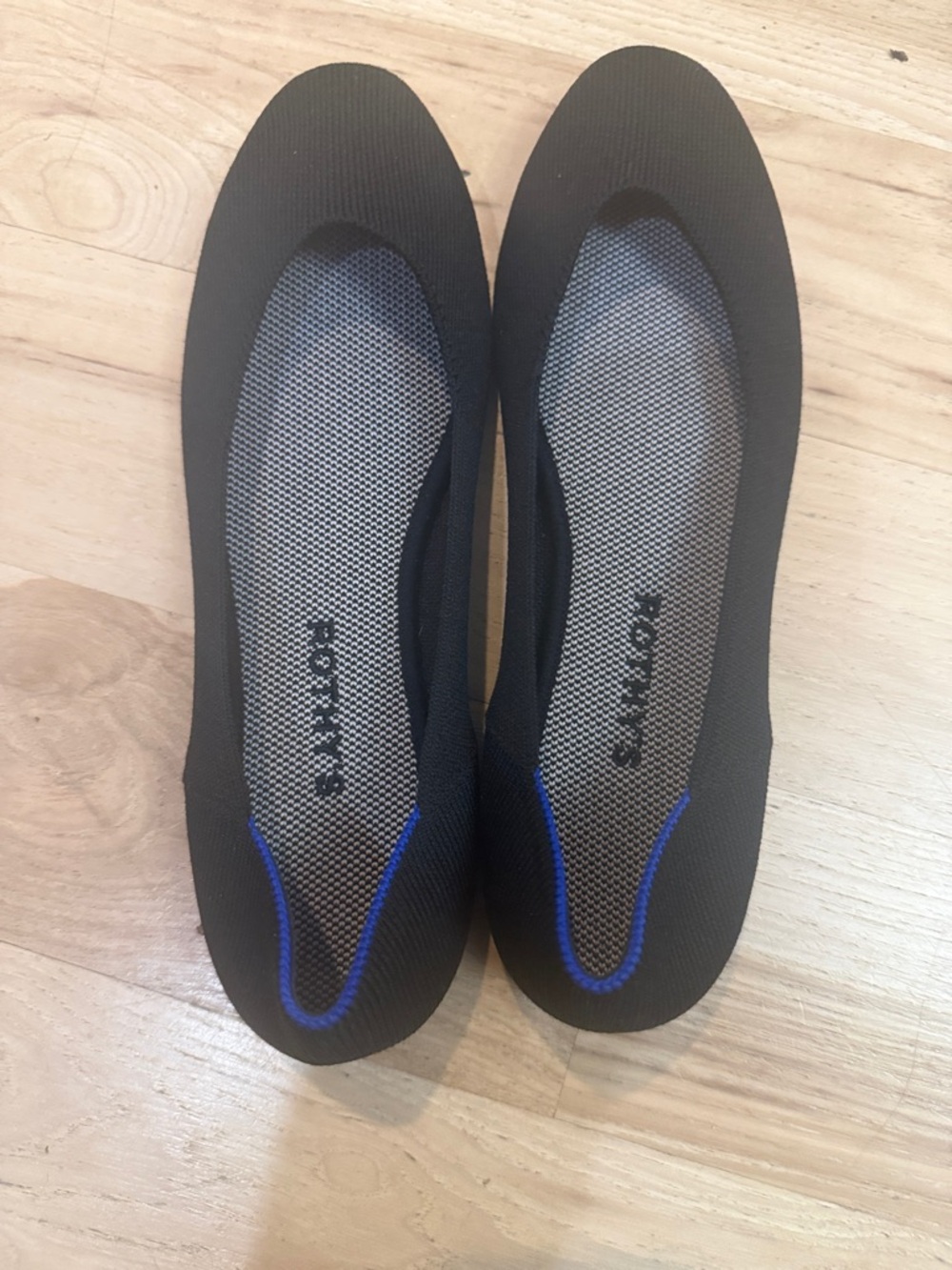 Rothy's Black Ballet Flats with Blue Trim